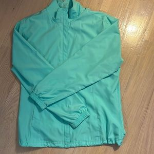 CALLAWAY LADIES light weight golf shell. Drawstring  bottom 100% polyester